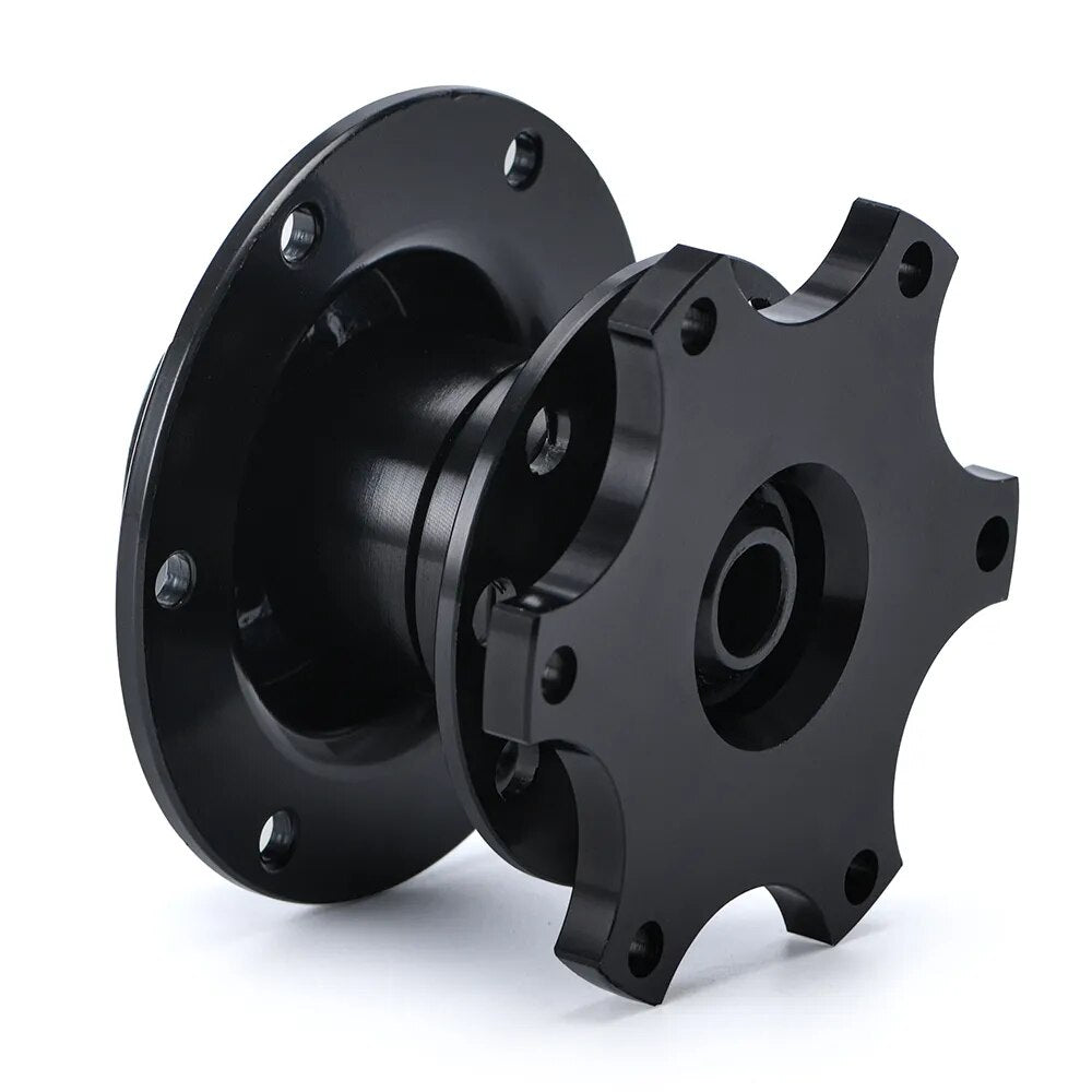 Guick release steering wheel hub adapter