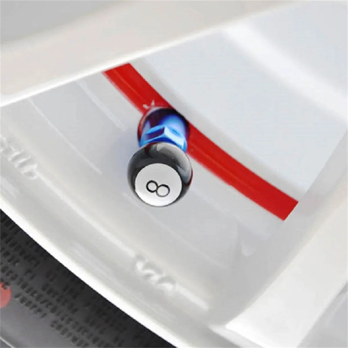 Tire valve cap with crown